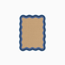 HÄDDEN Ripple cat scratching mat with organic wave shape. A modern sisal scratcher that doubles as a mini design rug