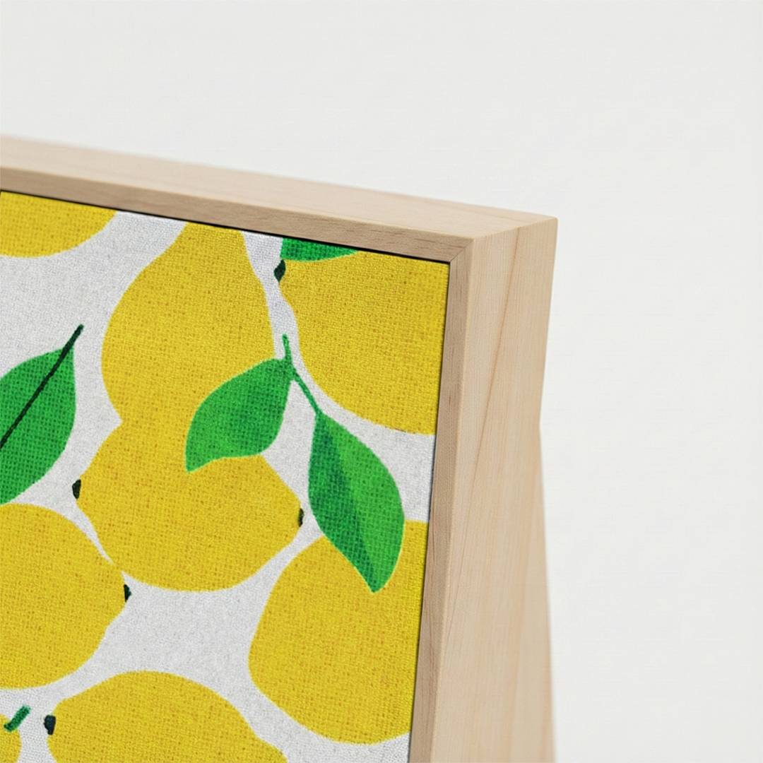 Detail of the woven sisal fabric showing the lemon print and natural wood frame. Durable, eco-friendly