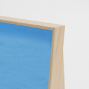 Side profile of HÄDDEN standing scratcher showing the stable triangular base. Ergonomic angle for cats to stretch and scratch