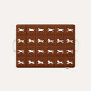 HÄDDEN Nomad Mat in mocha brown, a quilted cat travel mat with a cream galloping horse print and two carry handles