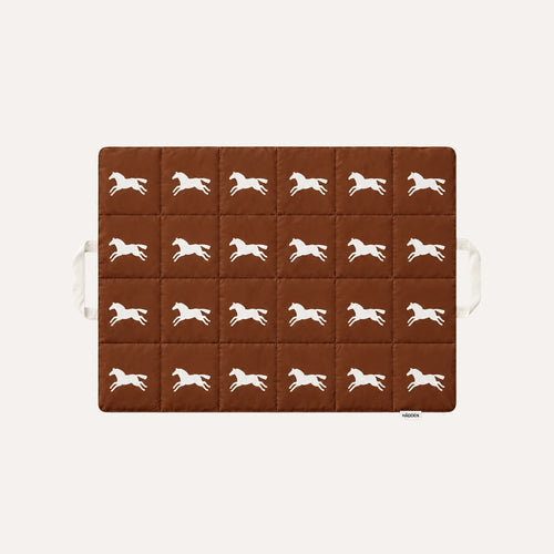 HÄDDEN Nomad Mat in mocha brown, a quilted cat travel mat with a cream galloping horse print and two carry handles